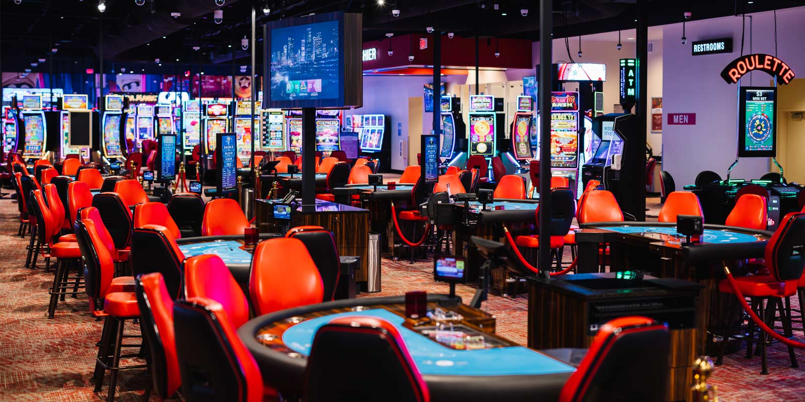 View of various table games at Gate City Casino